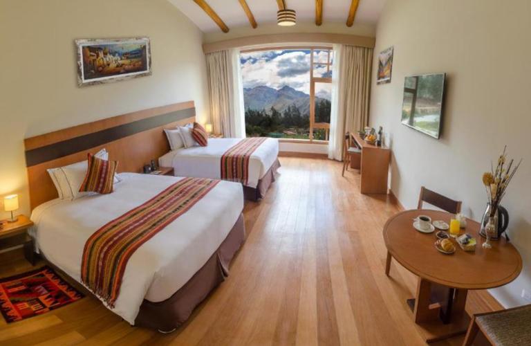 Habitación doble estándar Taypikala Hotel Deluxe Valle Sagrado Urubamba Habitación doble estándar Taypikala Hotel Deluxe Valle Sagrado Urubamba