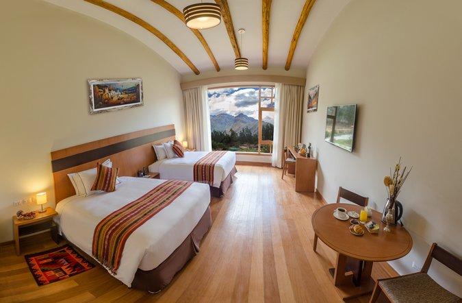 Habitación triple estándar Taypikala Hotel Deluxe Valle Sagrado Urubamba Habitación triple estándar Taypikala Hotel Deluxe Valle Sagrado Urubamba